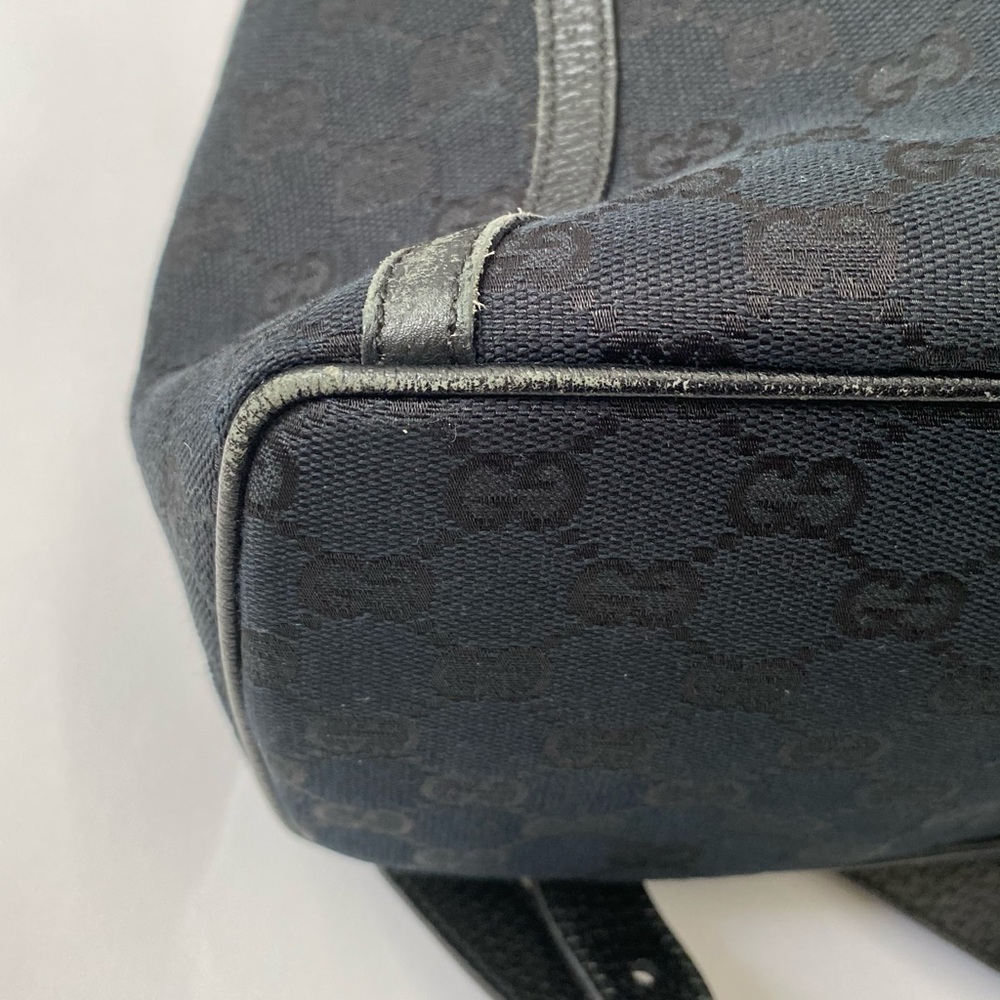 Gucci Black GG Canvas Drawstring Backpack with Gold Accent - Picture 8 of 14